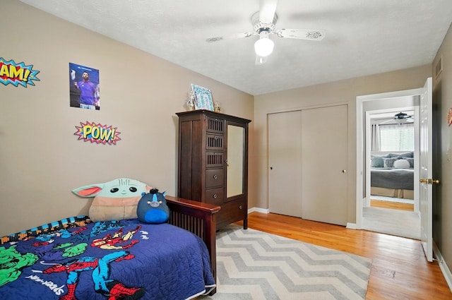 723 W Winmar Pl, Westerville, OH 43081 - bedroom with light wood-style floors, baseboards, a closet, and ceiling fan