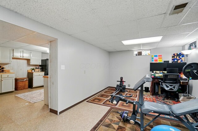 723 W Winmar Pl, Westerville, OH 43081 - exercise room featuring a drop ceiling, baseboards, and light floors