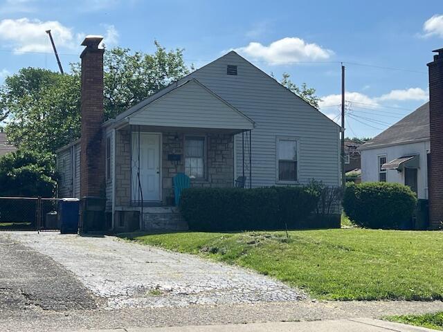 208 S Weyant Ave, Columbus, OH 43213 - bungalow-style home featuring stone siding, a chimney, and a porch