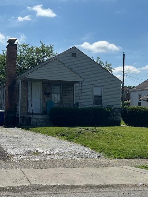 208 S Weyant Ave, Columbus, OH 43213 - bungalow featuring a front lawn and a chimney