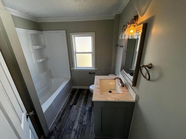 427 S Ogden Ave, Columbus, OH 43204 - full bath featuring wood finished floors, vanity, ornamental molding, toilet, and baseboards