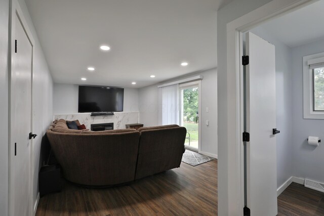 327 Warlock Ct, Columbus, OH 43230 - living area featuring dark wood finished floors, baseboards, recessed lighting, and a fireplace