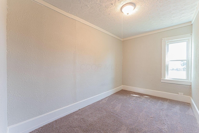167 Essex St, Newark, OH 43055 - carpeted empty room featuring a textured ceiling, baseboards, and a textured wall