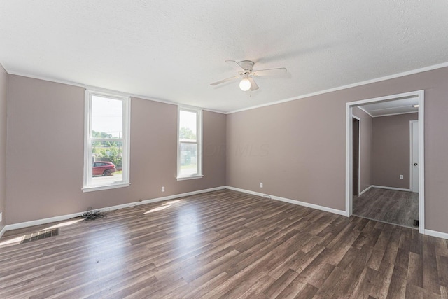 167 Essex St, Newark, OH 43055 - unfurnished room featuring wood finished floors, ceiling fan, baseboards, a textured ceiling, and crown molding