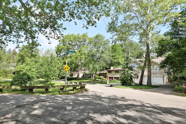 258 Canyon Dr, Columbus, OH 43214 - view of front of house with view of wooded area