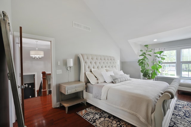258 Canyon Dr, Columbus, OH 43214 - bedroom featuring dark wood-type flooring, high vaulted ceiling, recessed lighting, and a chandelier