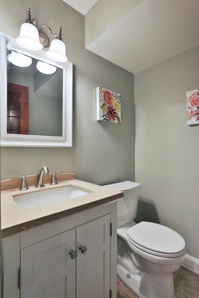 258 Canyon Dr, Columbus, OH 43214 - half bath with toilet, vanity, and tile patterned floors