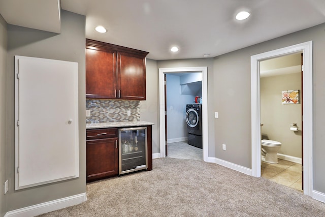 258 Canyon Dr, Columbus, OH 43214 - indoor dry bar with beverage cooler, light carpet, backsplash, recessed lighting, and baseboards