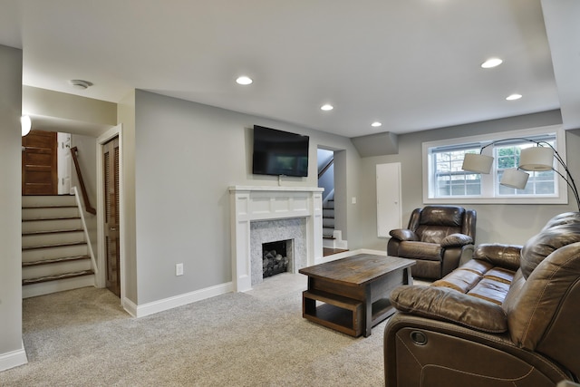 258 Canyon Dr, Columbus, OH 43214 - living room featuring stairway, carpet flooring, recessed lighting, a fireplace, and baseboards