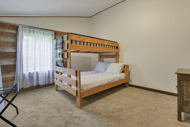 23587 Woltz Rd, Rockbridge, OH 43149 - bedroom with vaulted ceiling, carpet flooring, and baseboards