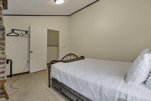 23587 Woltz Rd, Rockbridge, OH 43149 - bedroom with lofted ceiling, light colored carpet, and crown molding