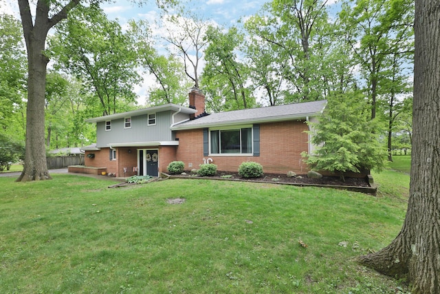 6653 Merwin Rd, Columbus, OH 43235 - rear view of property with brick siding and a chimney