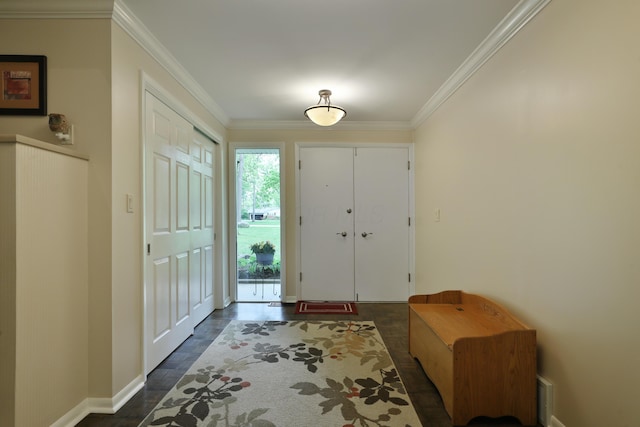 6653 Merwin Rd, Columbus, OH 43235 - foyer entrance with crown molding, dark wood-type flooring, and baseboards