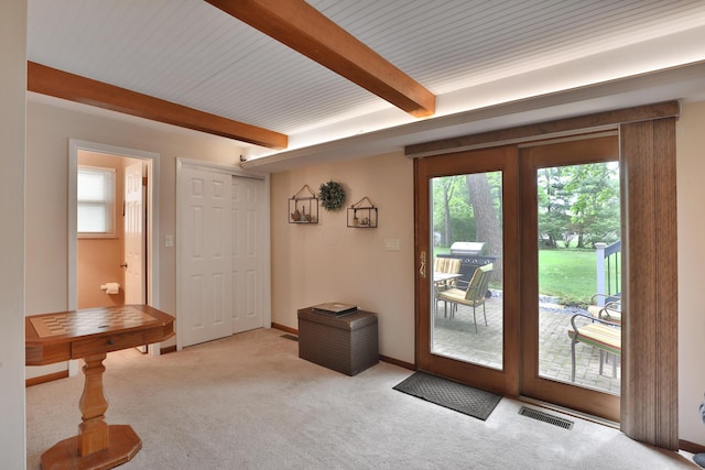 6653 Merwin Rd, Columbus, OH 43235 - doorway with beam ceiling, carpet, and baseboards
