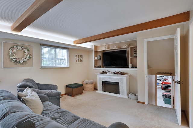 6653 Merwin Rd, Columbus, OH 43235 - carpeted living room featuring beamed ceiling and a fireplace