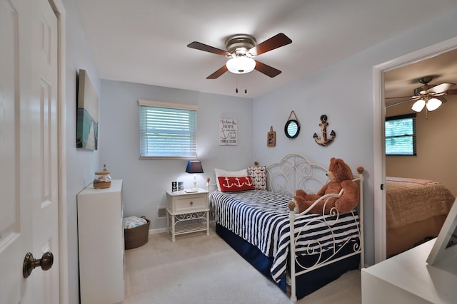 6653 Merwin Rd, Columbus, OH 43235 - bedroom featuring multiple windows, carpet flooring, and a ceiling fan