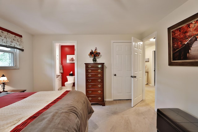 6653 Merwin Rd, Columbus, OH 43235 - bedroom with light carpet and ensuite bath