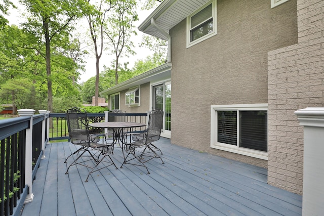 6653 Merwin Rd, Columbus, OH 43235 - wooden deck with outdoor dining area
