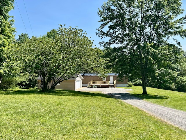 1904 Thornton-Spung Rd, Kingston, OH 45644 - view of green lawn with an outdoor structure and a garage