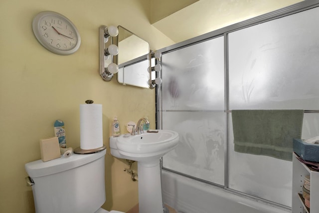 1920 S Champion Ave, Columbus, OH 43207 - bathroom with combined bath / shower with glass door and toilet
