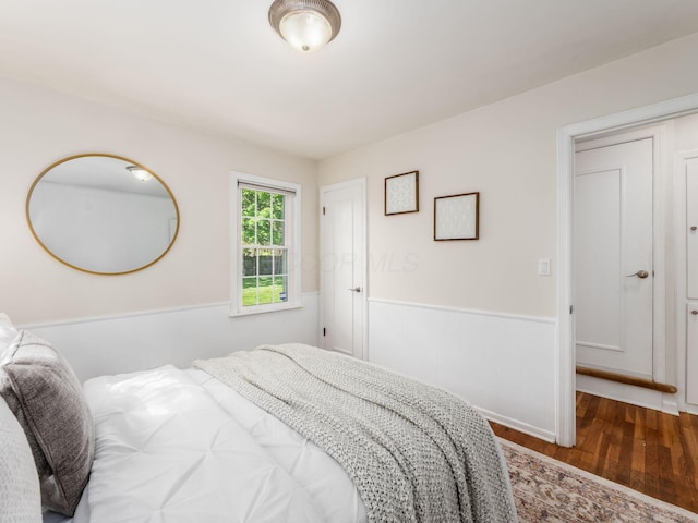 2356 Swansea Rd, Columbus, OH 43221 - bedroom with wood finished floors and a wainscoted wall