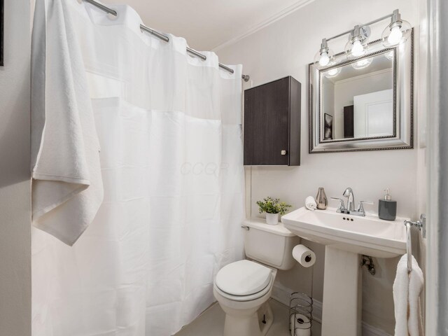 2356 Swansea Rd, Columbus, OH 43221 - bathroom with toilet, a shower with curtain, and a sink