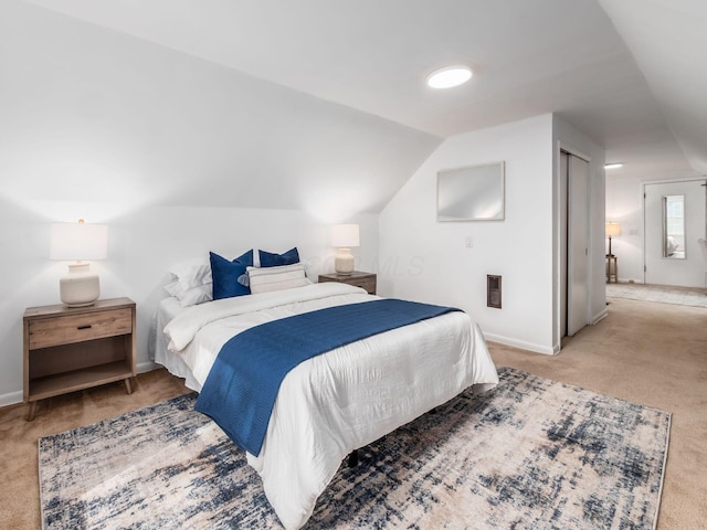 2356 Swansea Rd, Columbus, OH 43221 - bedroom with carpet floors, vaulted ceiling, baseboards, and heating unit