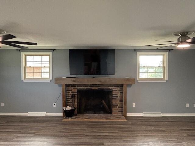 4367 Helena Ct, Springfield, OH 45503 - unfurnished living room with a ceiling fan, a fireplace, wood finished floors, baseboards, and plenty of natural light