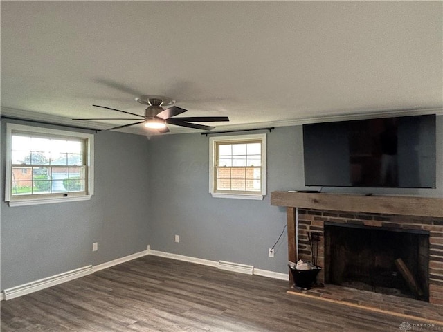 4367 Helena Ct, Springfield, OH 45503 - unfurnished living room featuring a ceiling fan, wood finished floors, a brick fireplace, and baseboards