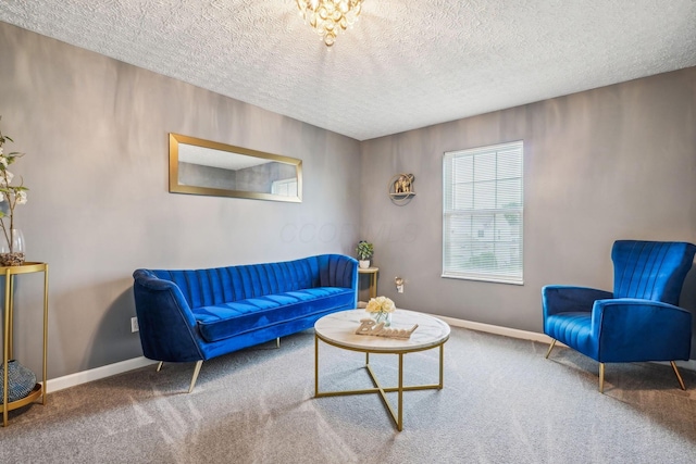 1536 Mulligan Ct, Reynoldsburg, OH 43068 - carpeted living room with baseboards and a textured ceiling