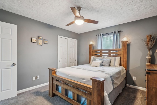 1536 Mulligan Ct, Reynoldsburg, OH 43068 - bedroom featuring carpet floors, a closet, baseboards, a ceiling fan, and a textured ceiling