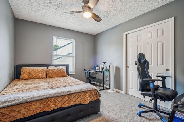 1536 Mulligan Ct, Reynoldsburg, OH 43068 - bedroom with carpet, a closet, a ceiling fan, and a textured ceiling
