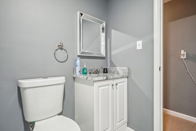 1536 Mulligan Ct, Reynoldsburg, OH 43068 - half bathroom with toilet, vanity, and baseboards