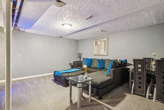 1536 Mulligan Ct, Reynoldsburg, OH 43068 - living area with carpet floors, a textured ceiling, and baseboards