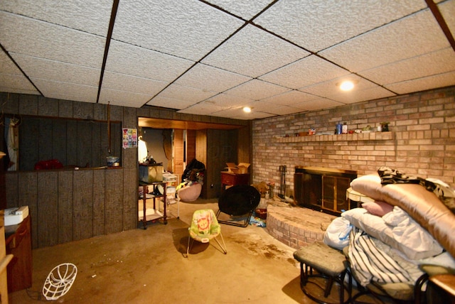 4510 Broadhurst Dr, Columbus, OH 43213 - finished below grade area featuring a paneled ceiling, a fireplace, and wood walls