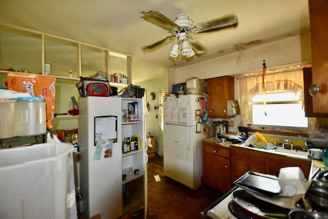4510 Broadhurst Dr, Columbus, OH 43213 - kitchen featuring freestanding refrigerator, a ceiling fan, and a sink
