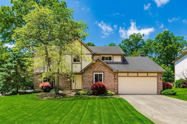 665 Northbridge Ct, Westerville, OH 43081 - tudor home with driveway, a garage, a front yard, brick siding, and stucco siding