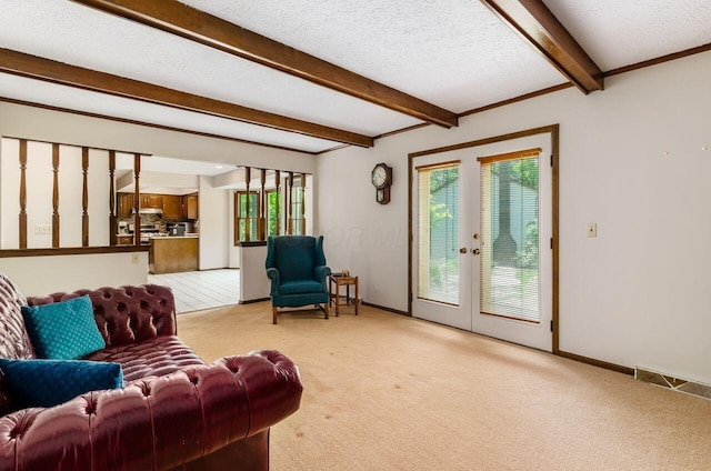 665 Northbridge Ct, Westerville, OH 43081 - living area featuring light carpet, beam ceiling, french doors, a textured ceiling, and baseboards