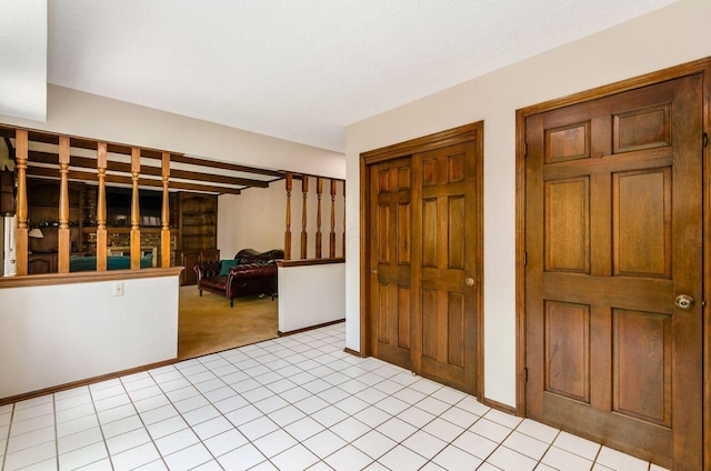 665 Northbridge Ct, Westerville, OH 43081 - foyer featuring light carpet, light tile patterned floors, and baseboards