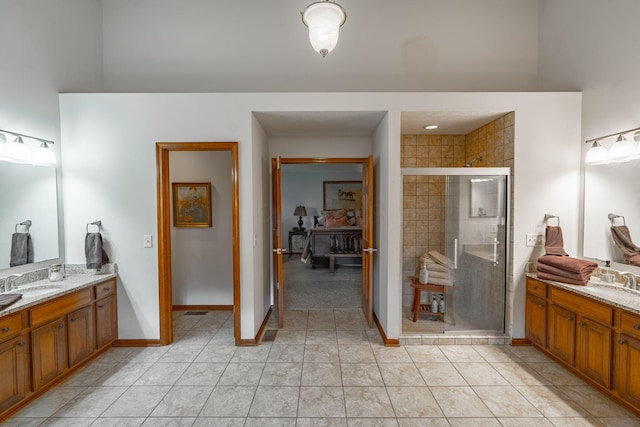 8738 Birch Brook Loop NW, Pickerington, OH 43147 - bathroom featuring vanity, a shower stall, baseboards, and tile patterned flooring