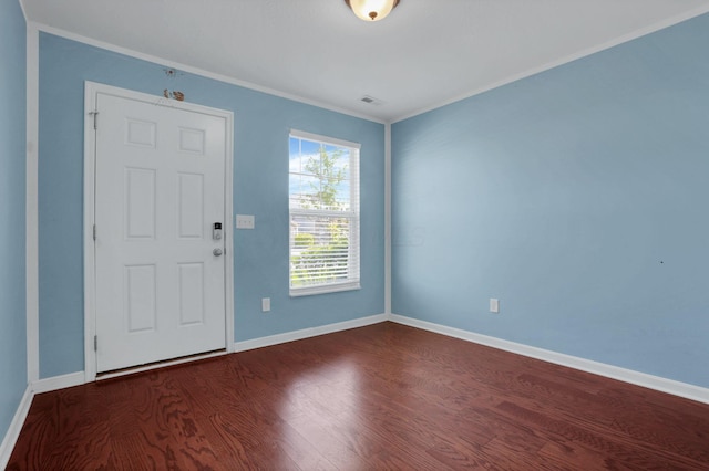 7429 Willow Leaf Dr, Canal Winchester, OH 43110 - foyer featuring wood finished floors, crown molding, and baseboards
