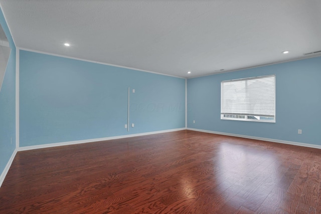 7429 Willow Leaf Dr, Canal Winchester, OH 43110 - unfurnished room with dark wood-type flooring, baseboards, ornamental molding, and recessed lighting