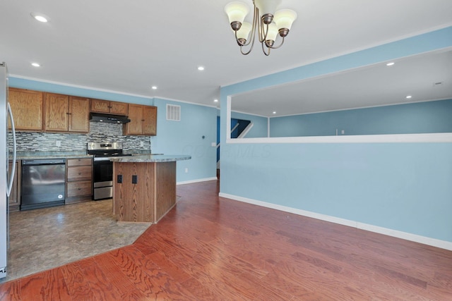 7429 Willow Leaf Dr, Canal Winchester, OH 43110 - kitchen featuring electric stove, dishwashing machine, under cabinet range hood, open floor plan, and a center island