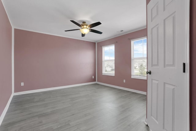 7429 Willow Leaf Dr, Canal Winchester, OH 43110 - spare room with wood finished floors, baseboards, and a ceiling fan