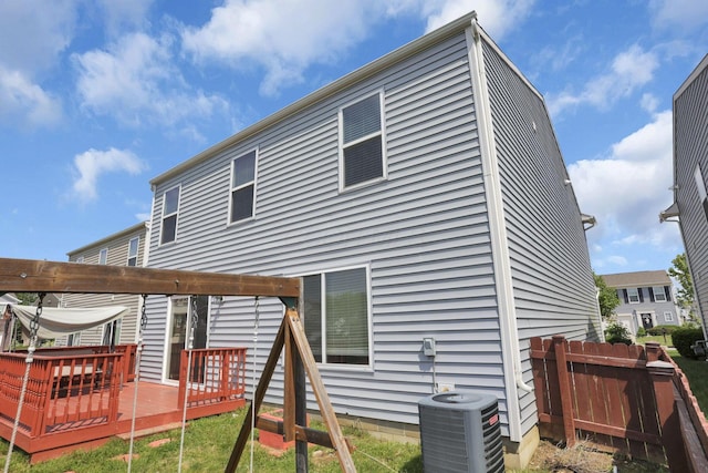 7429 Willow Leaf Dr, Canal Winchester, OH 43110 - rear view of house with a wooden deck and central AC unit