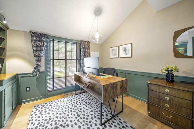 1009 Tall Tree Ct, Westerville, OH 43081 - home office with wainscoting, light wood-type flooring, vaulted ceiling, and a decorative wall