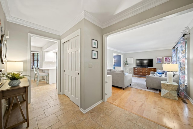 1009 Tall Tree Ct, Westerville, OH 43081 - corridor featuring stone tile floors, baseboards, and ornamental molding