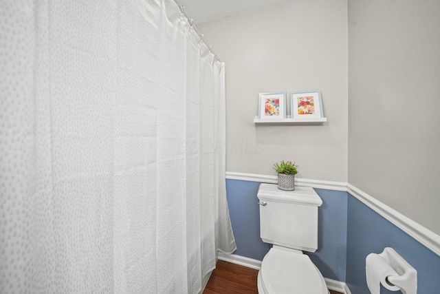 1009 Tall Tree Ct, Westerville, OH 43081 - full bathroom featuring toilet, baseboards, and wood finished floors