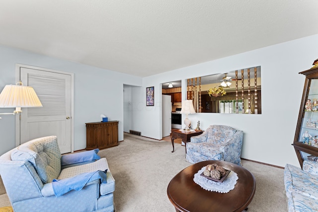 4818 Manitoba Rd, Columbus, OH 43229 - carpeted living area with baseboards