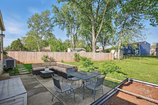 651 Dovalon Pl, Galloway, OH 43119 - view of patio / terrace with central AC unit and an outdoor living space